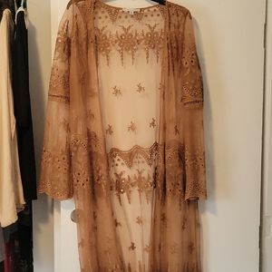 Sheer cover up. Brown/copper color with embroidered designs. Size XL